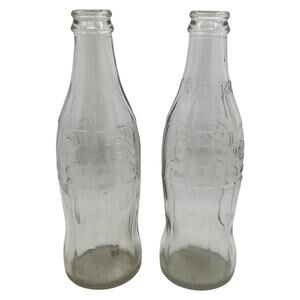 Pair of Clear 10 Oz Coca Cola Bottles Embossed Logos Contour Shape 68 and 71